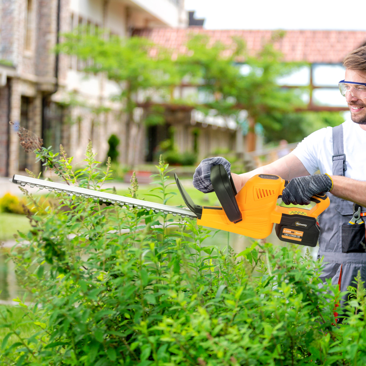 Orange Hedge Trimmer with 2 Battery Packs